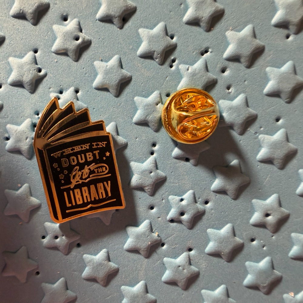 Out of Print Gold and Black 'When In Doubt Go to the Library' Enamel Pin